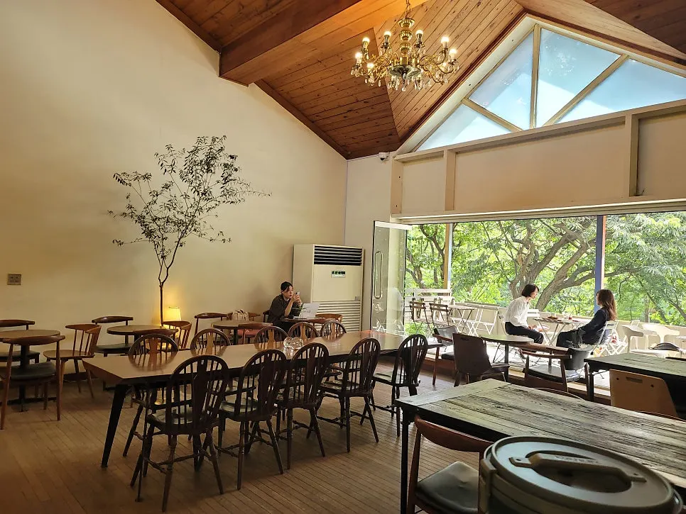 Forerest's hall filled with wood-tone furniture