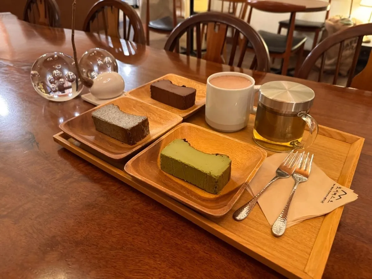 Three slices of Basque cheesecake on the table