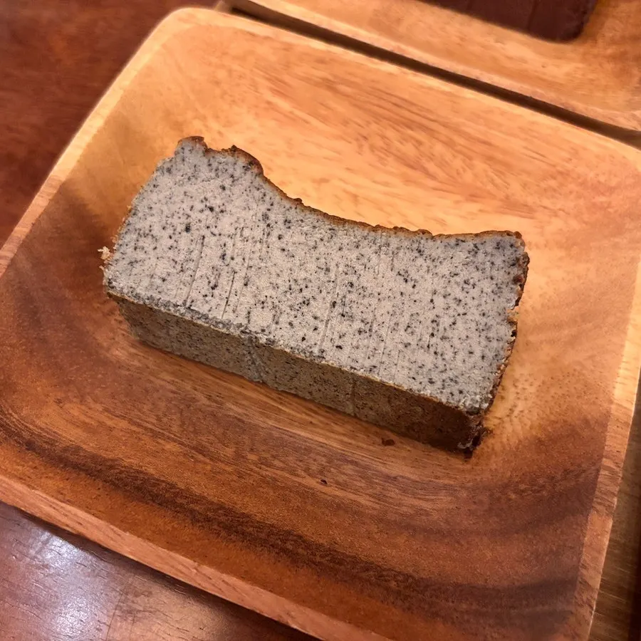 A slice of black sesame Basque cheesecake