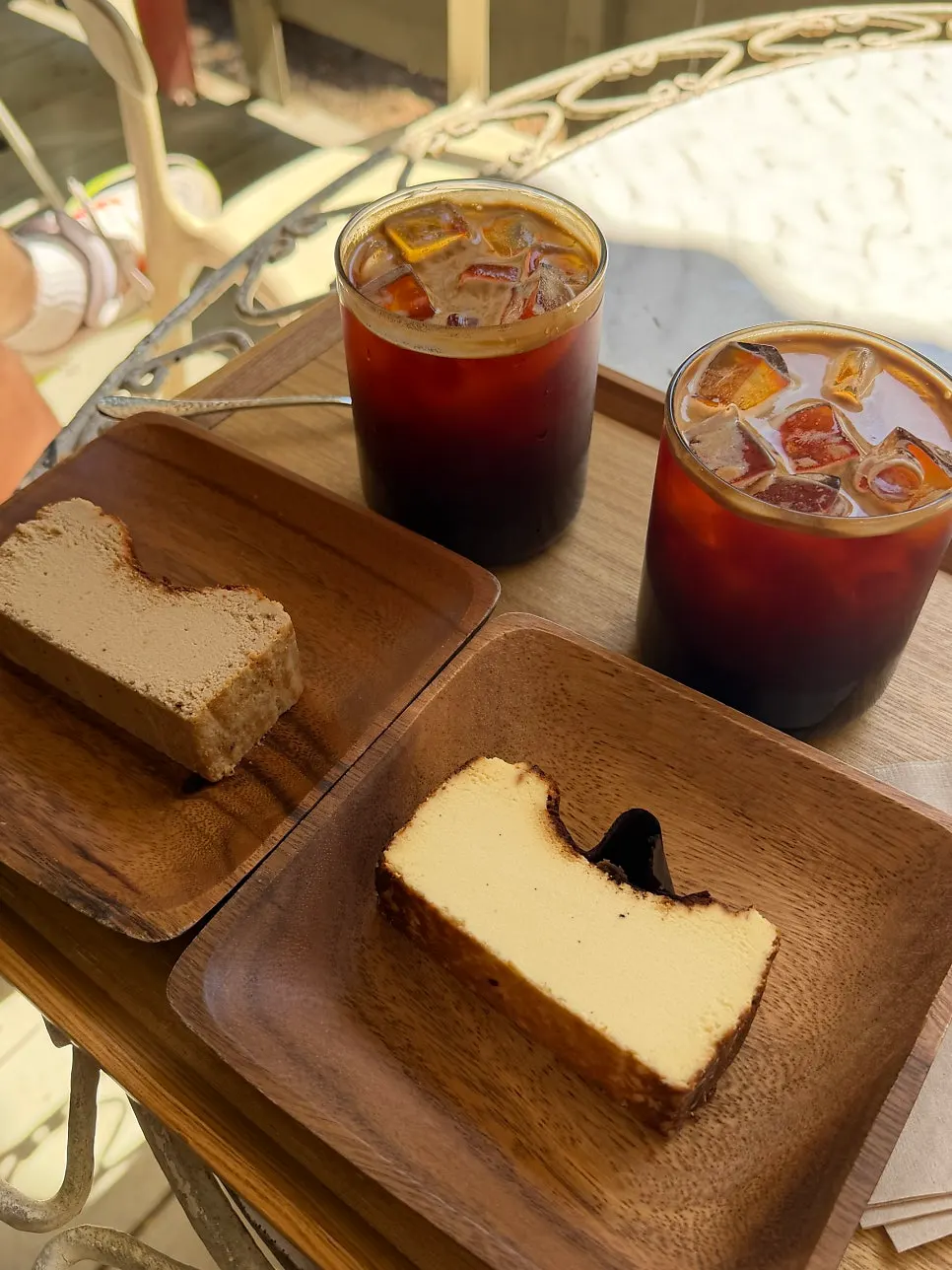 Two types of Basque cheesecake on the table