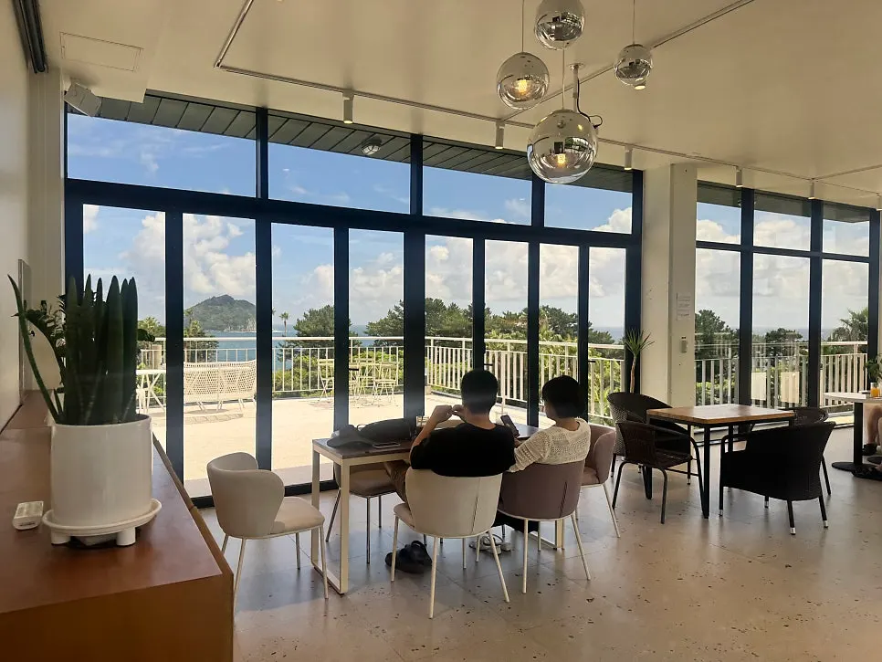 Second-floor seating with generously spaced tables