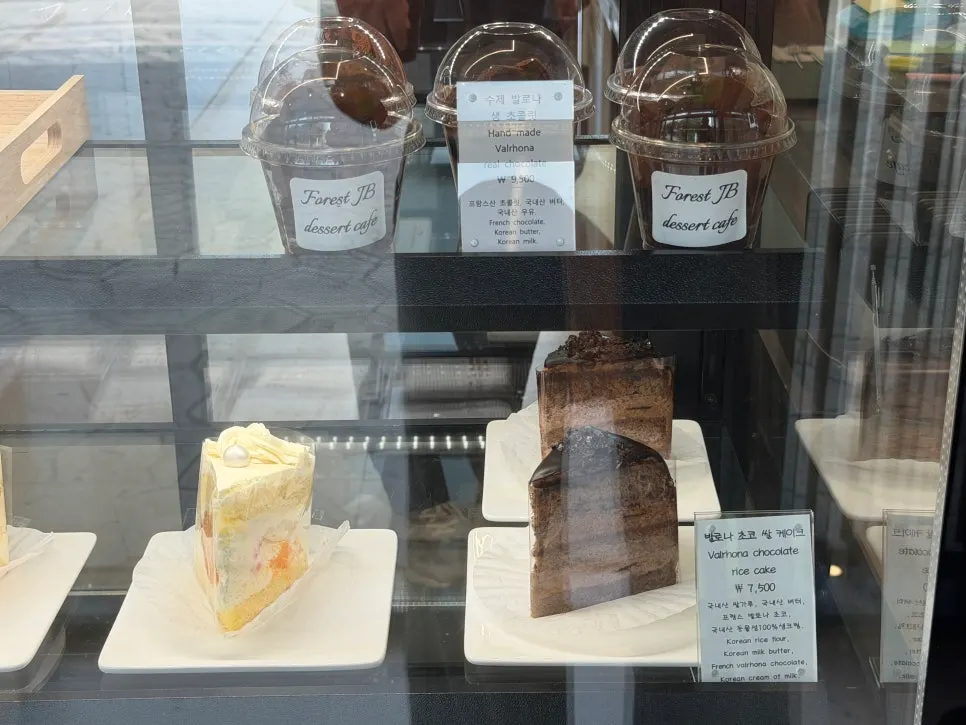 Cakes and desserts displayed on the counter