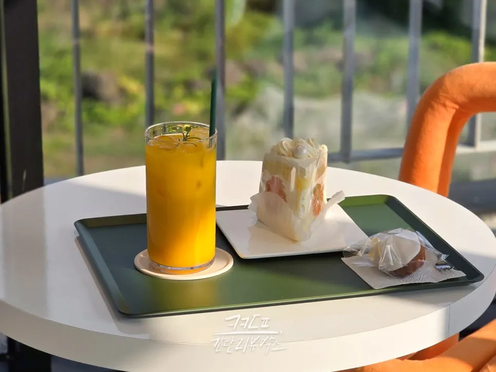 Hallabong fresh-pressed juice, tangerine yogurt cake, and madeleine