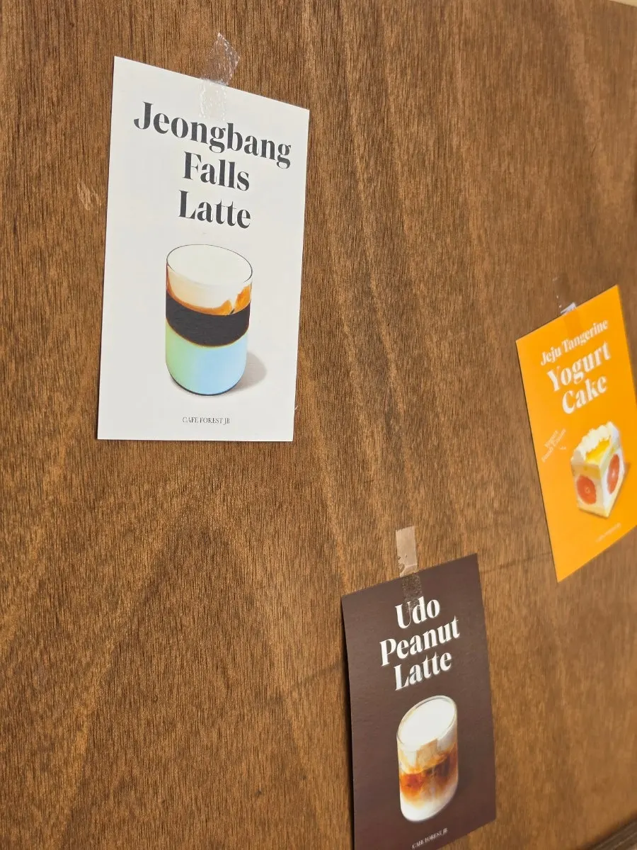 Signature menu poster on the café window