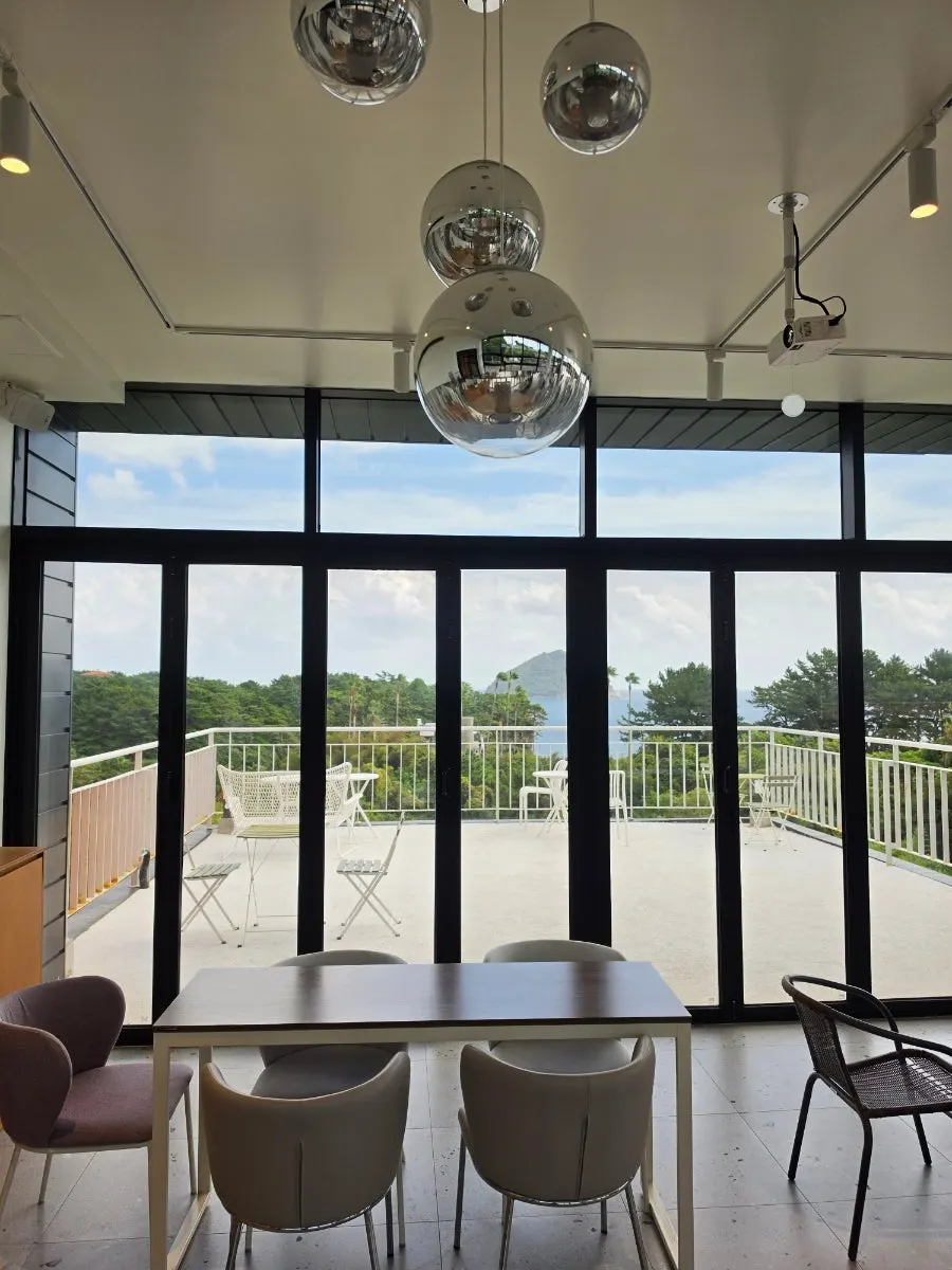 2nd floor seating with sea view through picture windows