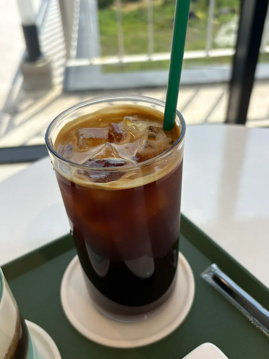 Iced americano paired with three dessert items