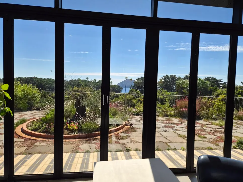 View of Forest Jeongbang café with the sea visible