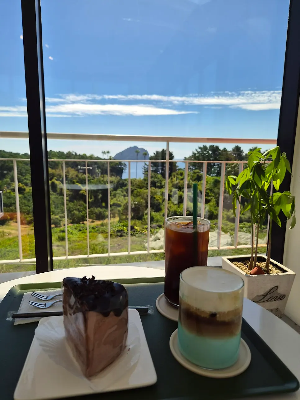 Exterior of the ocean-view café near Jeongbang Waterfall
