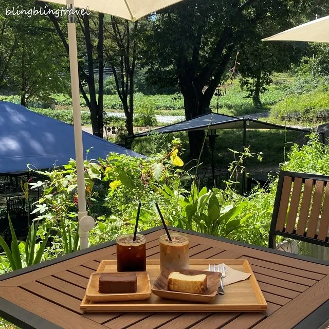 Decaf iced latte set on an outdoor table