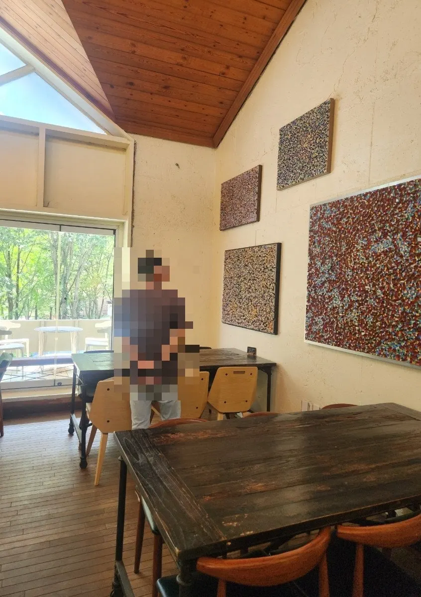 Interior with plants and artwork
