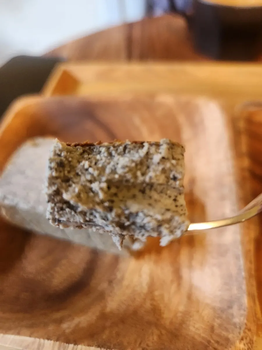 A slice of black sesame Basque cheesecake