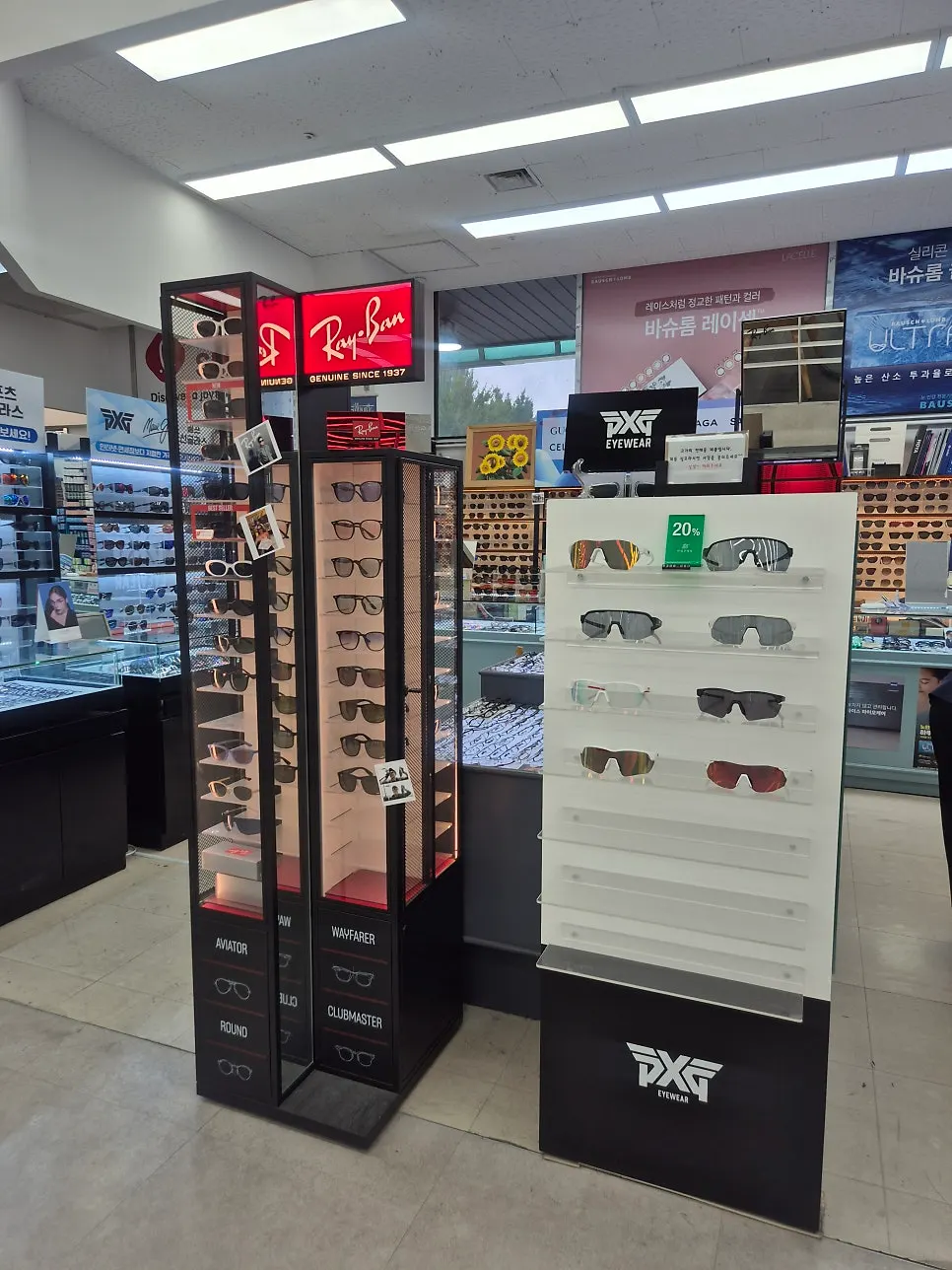 Display counter with Ray-Ban and Oakley sunglasses