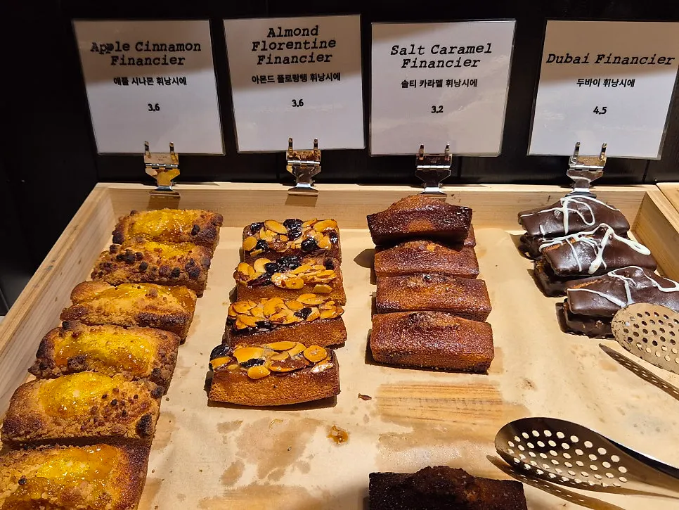 Various desserts arranged in the display case