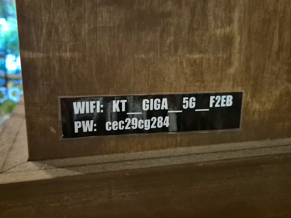 Corner of the café with wifi information posted