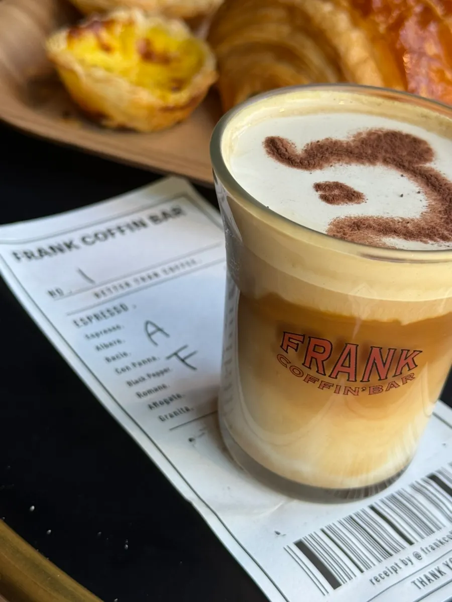 Frank Coffee served alongside a dessert