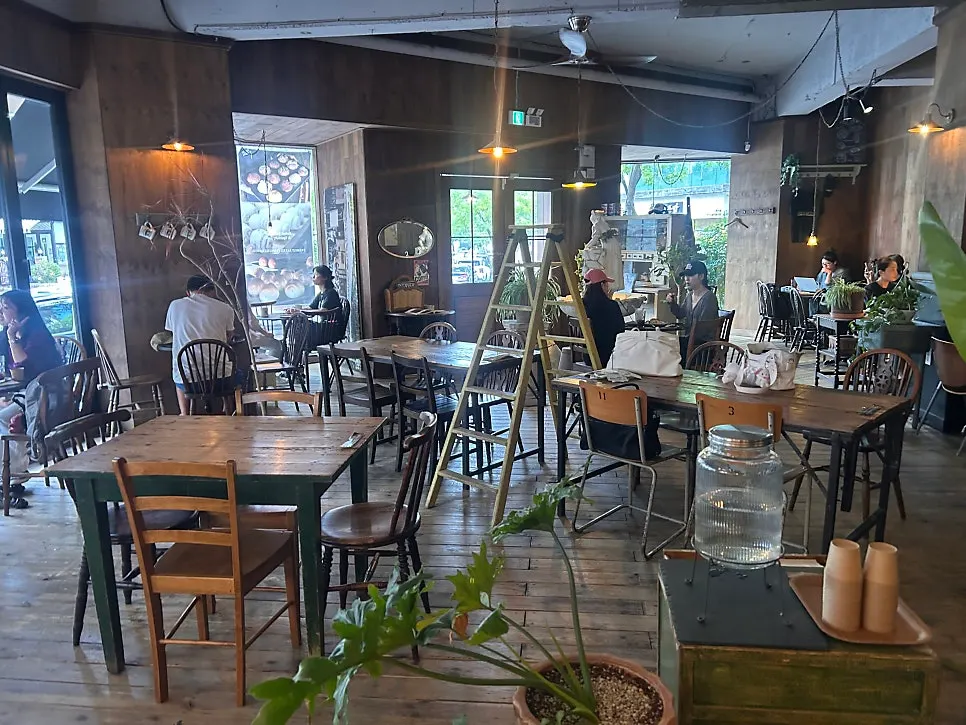 Interior of Frank Coffee Bar filled with vintage furniture