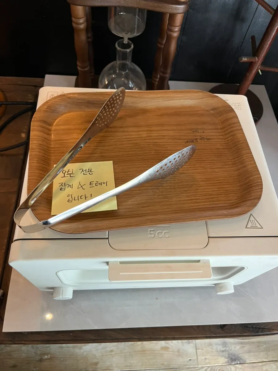 Trays for loading bread next to the display case