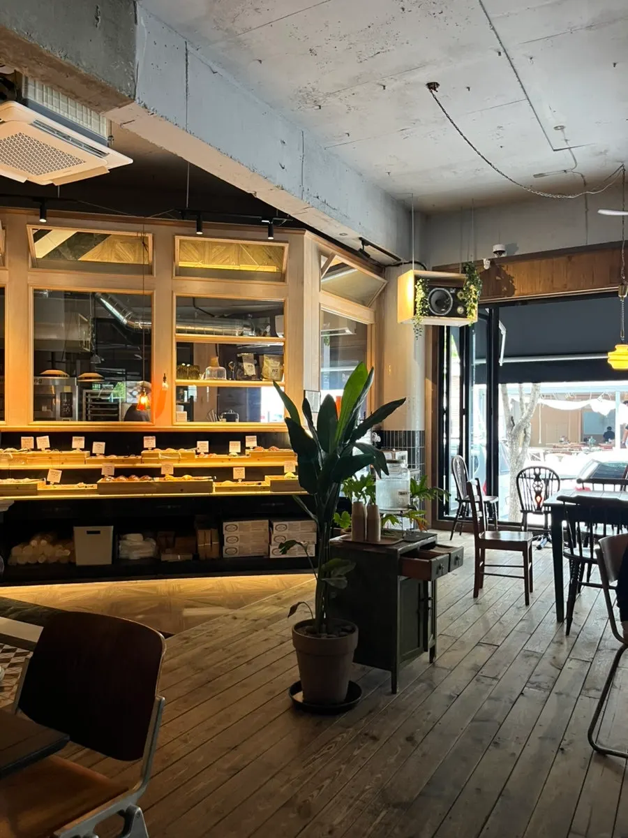 Dimly lit wood-tone café interior