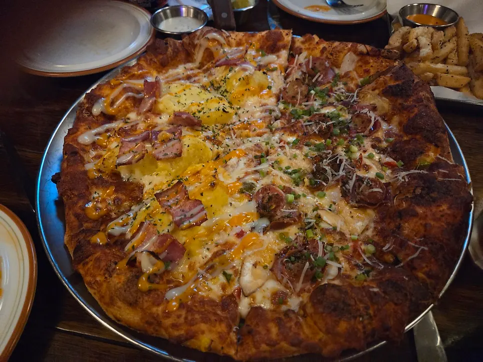 Close-up of toppings on the half-and-half pizza
