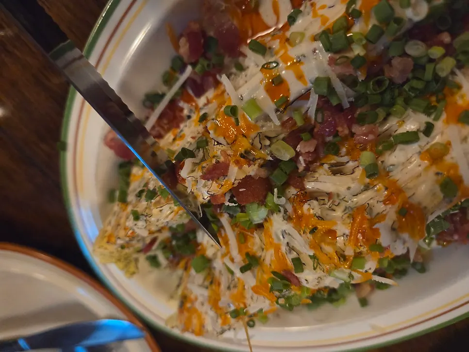 Napa cabbage salad ordered alongside the pizza