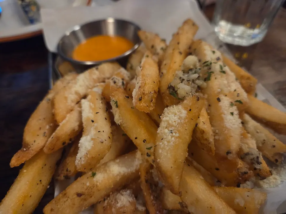 Garlic butter fries paired with pizza
