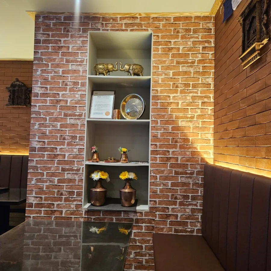 Basement entrance of the Indian restaurant near Samseong Station