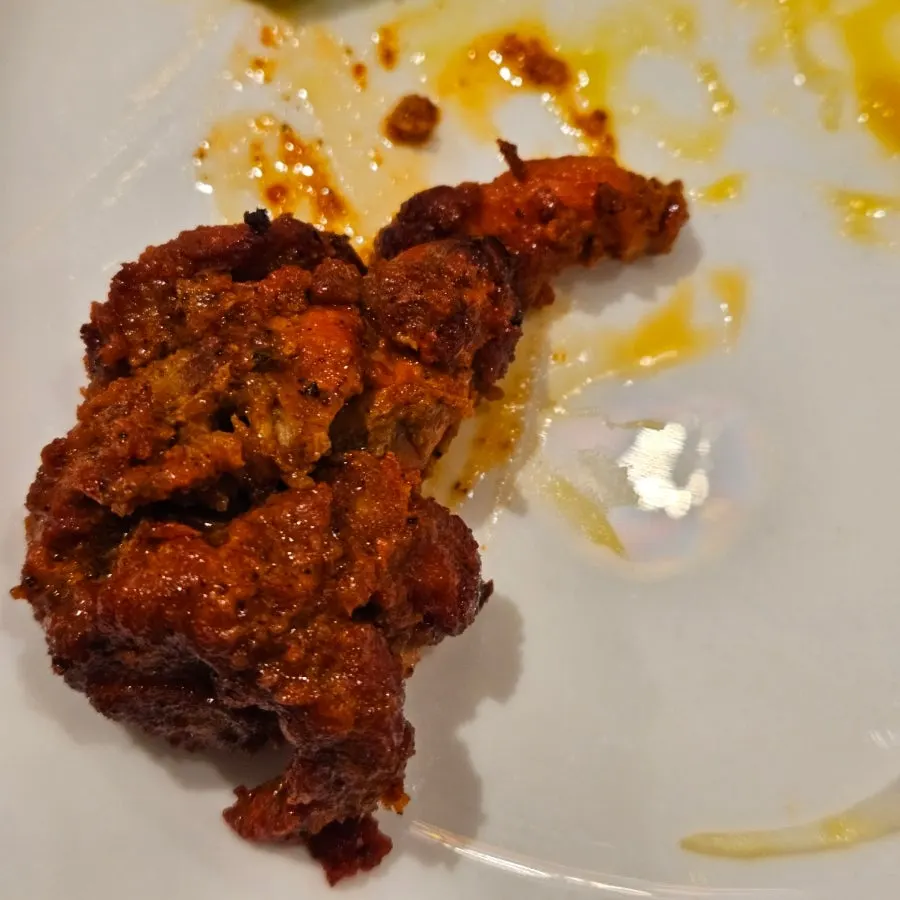 Boneless tandoori chicken coated in thick sauce