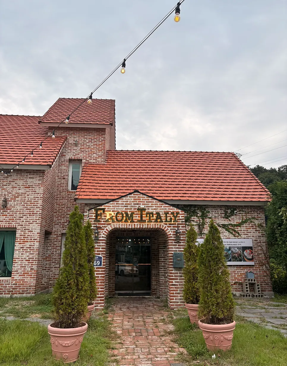 Italian-style signage at the entrance of From Italy