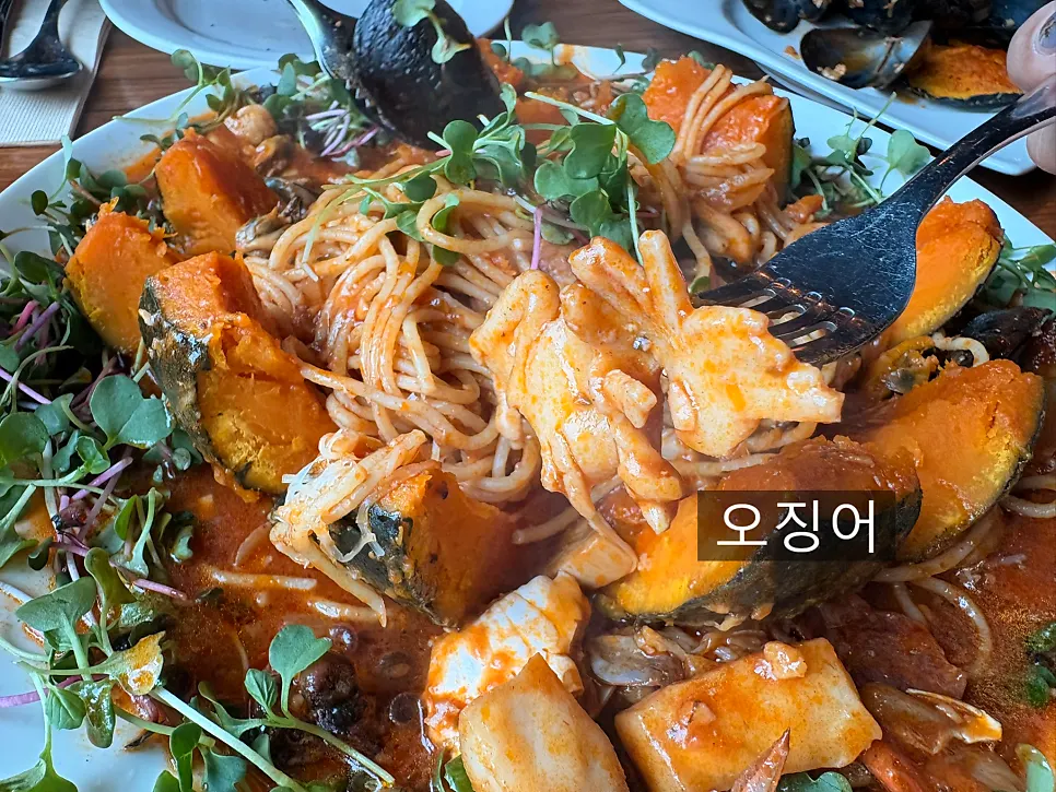 Close-up of the seafood in the zuca dolce pasta