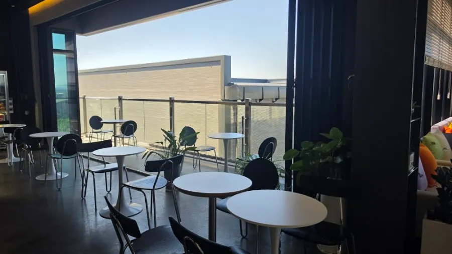 Table with a window view at Fruit Forest