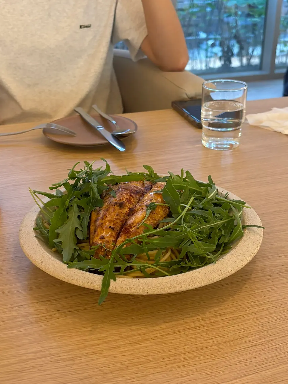 Mackerel pasta topped with a piece of mackerel