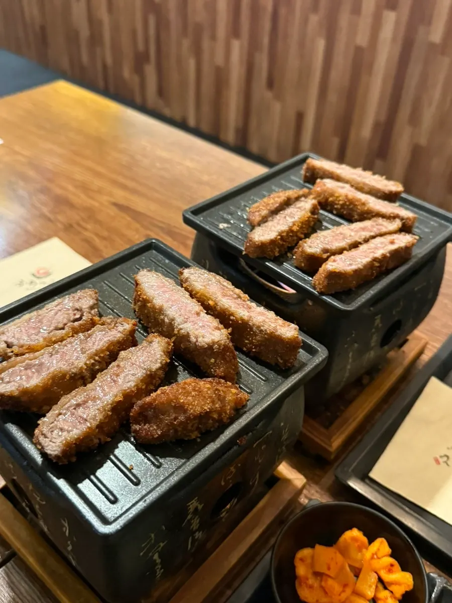 A piece of gyukatsu grilled golden on both sides