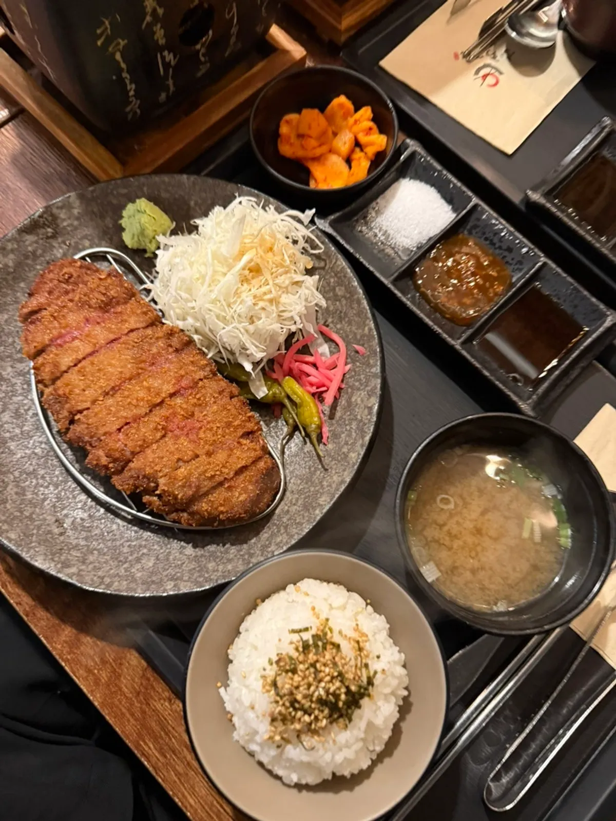 Close-up of a crispy-grilled piece of Hurato Sikdang gyukatsu