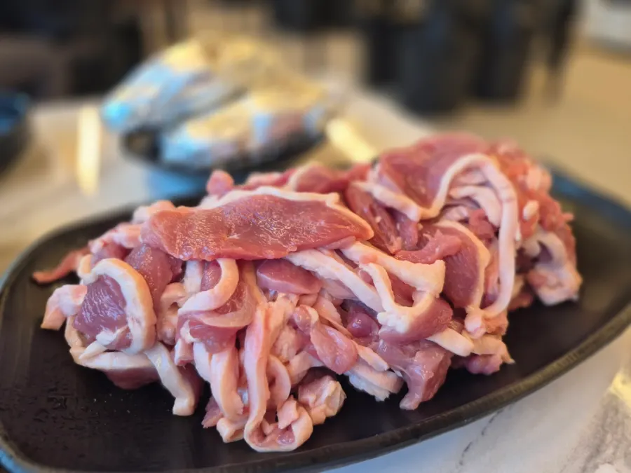 Plate of raw duck, two servings, at Ganaandeok Gyeyang Branch