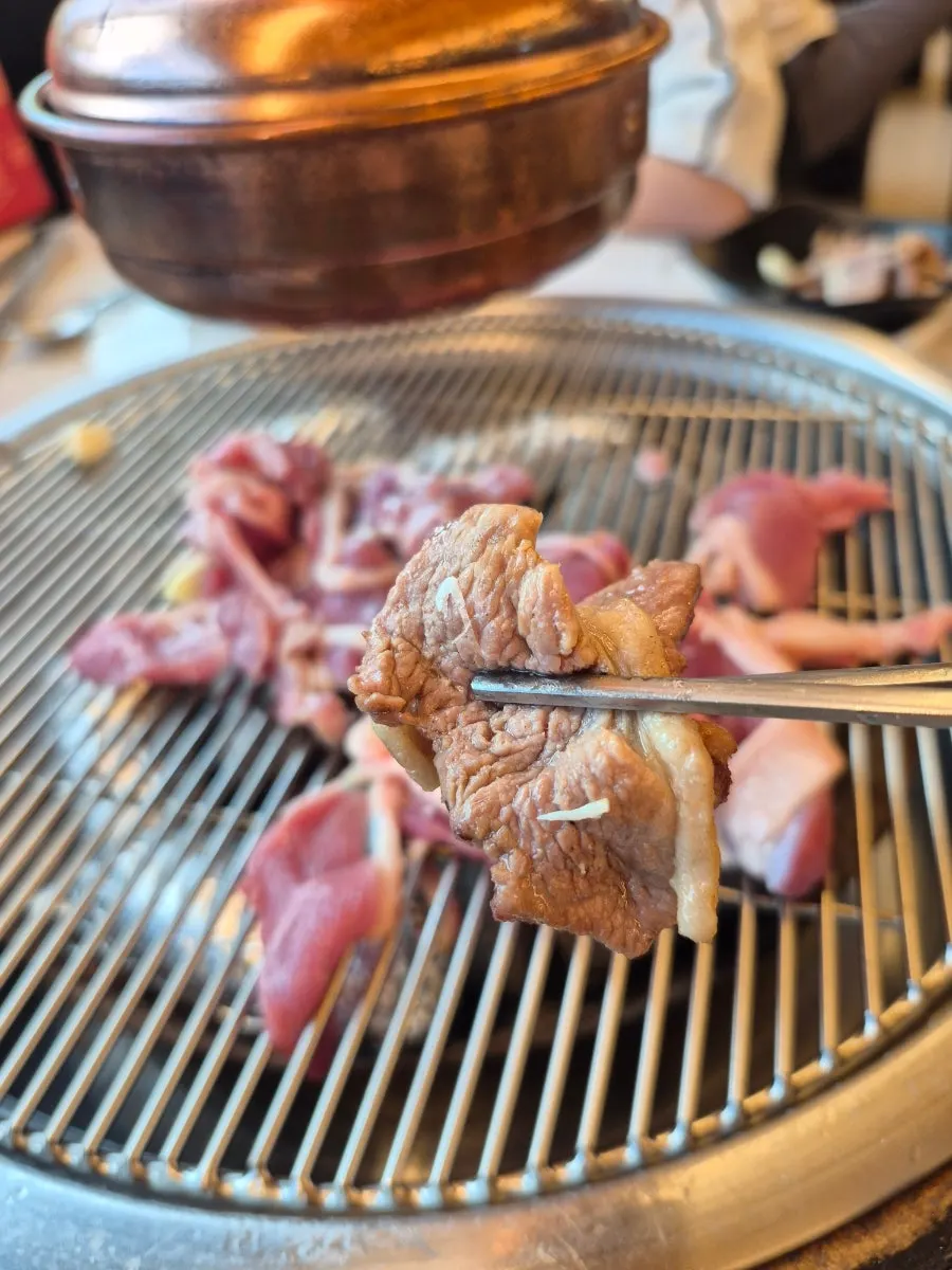 Raw duck served with red bean sprouts