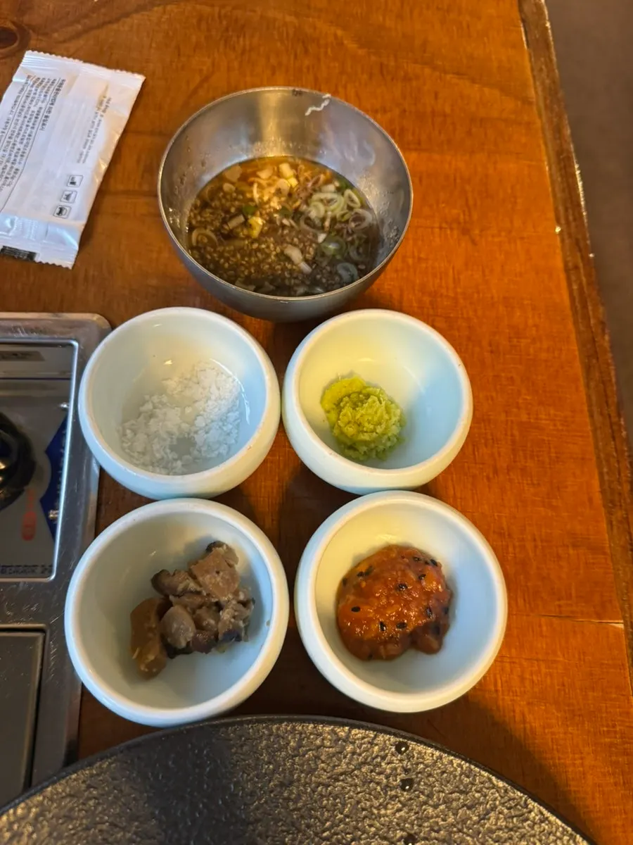 The full spread of dishes eaten by the couple at Gwangseonjip