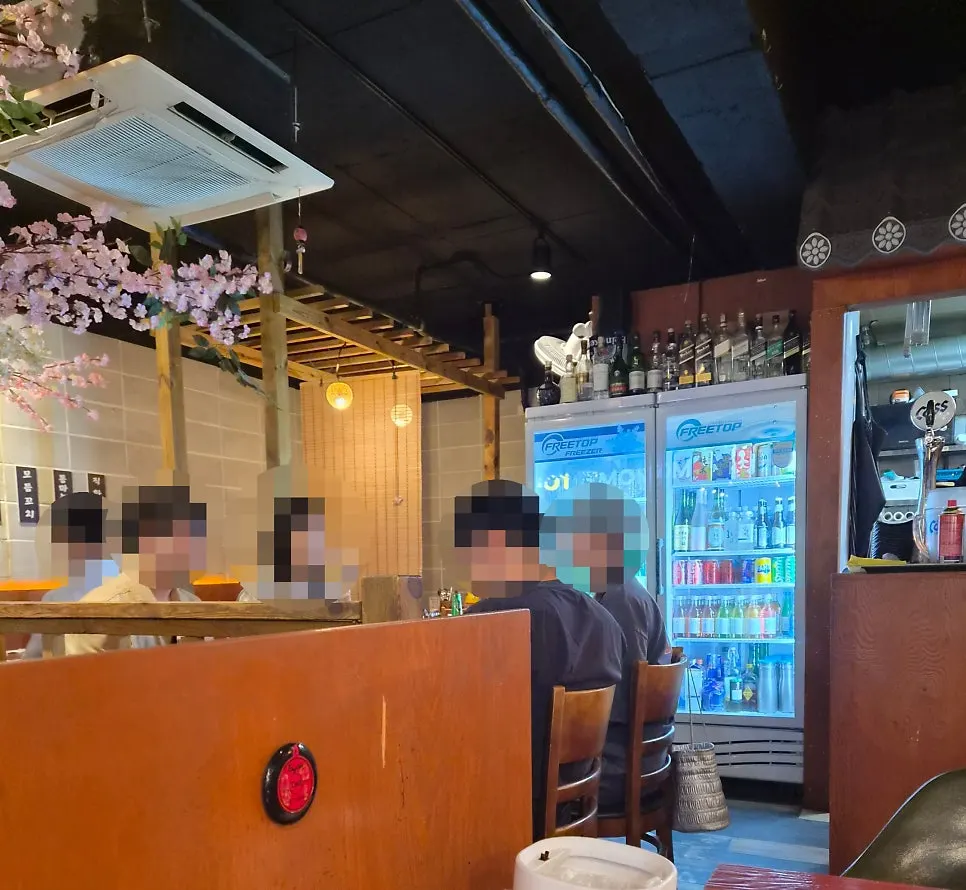 Pocha interior with guests late at night