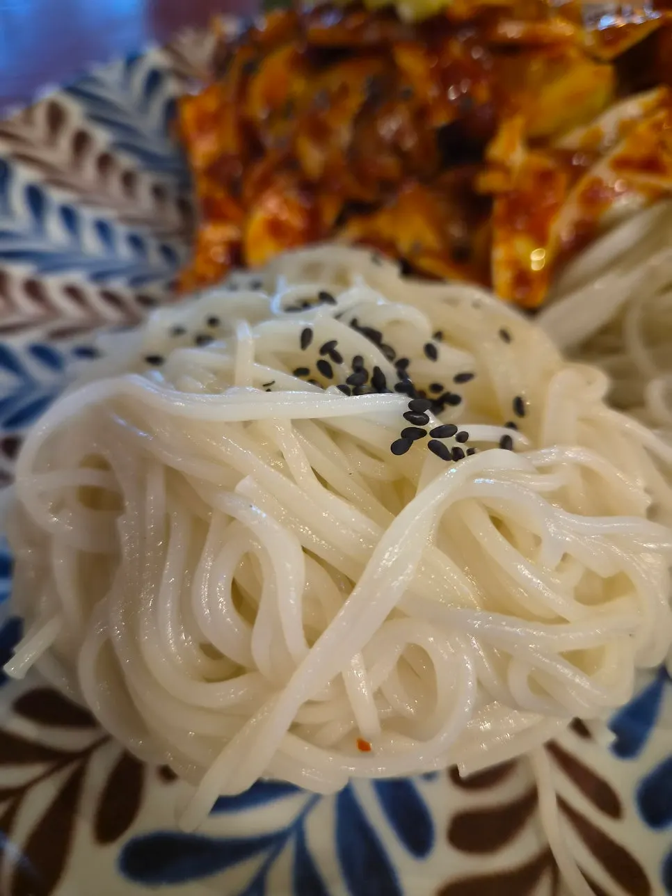 Chewy noodles in whelk somyeon