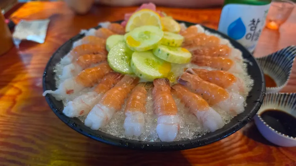 Jeju sweet shrimp sashimi with cucumber served over ice