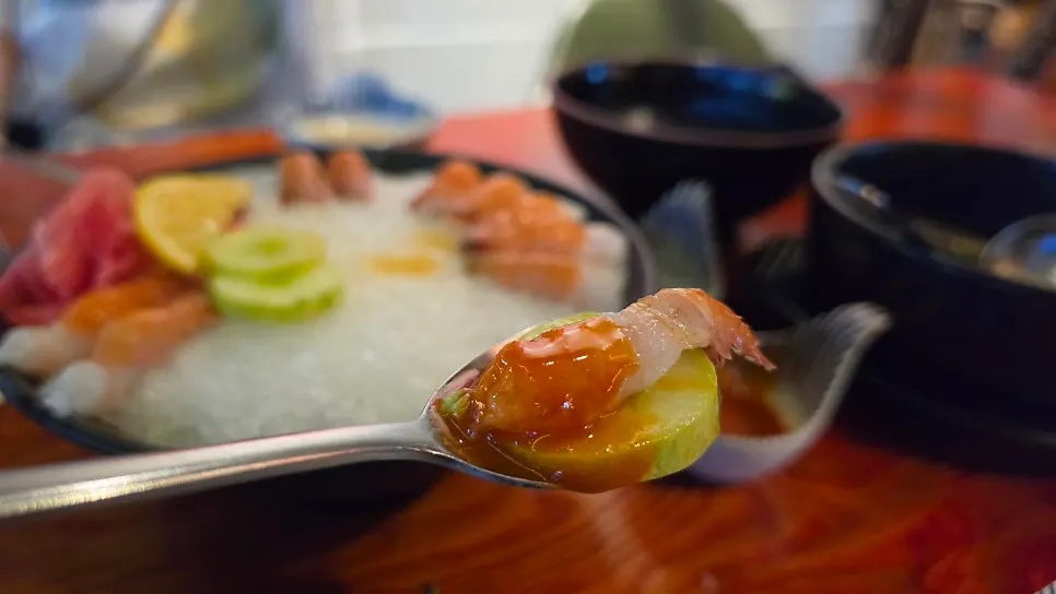 Sweet shrimp sashimi served with soy sauce and wasabi