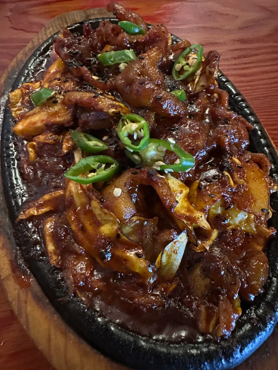 A plate of fire-grilled boneless dakbal with smoky flavor