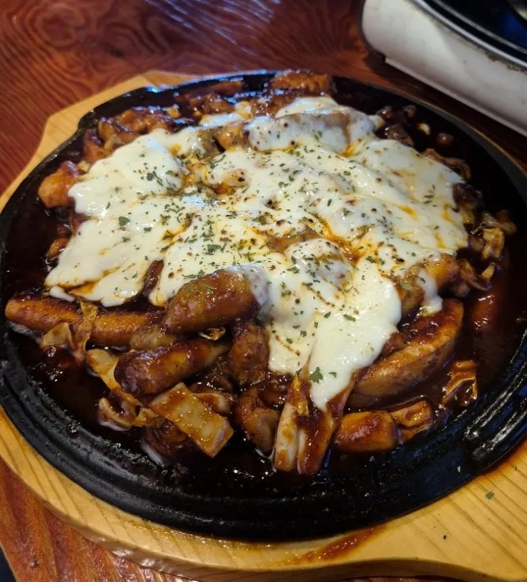 Fire-grilled cheese dakbal piled high with cheese