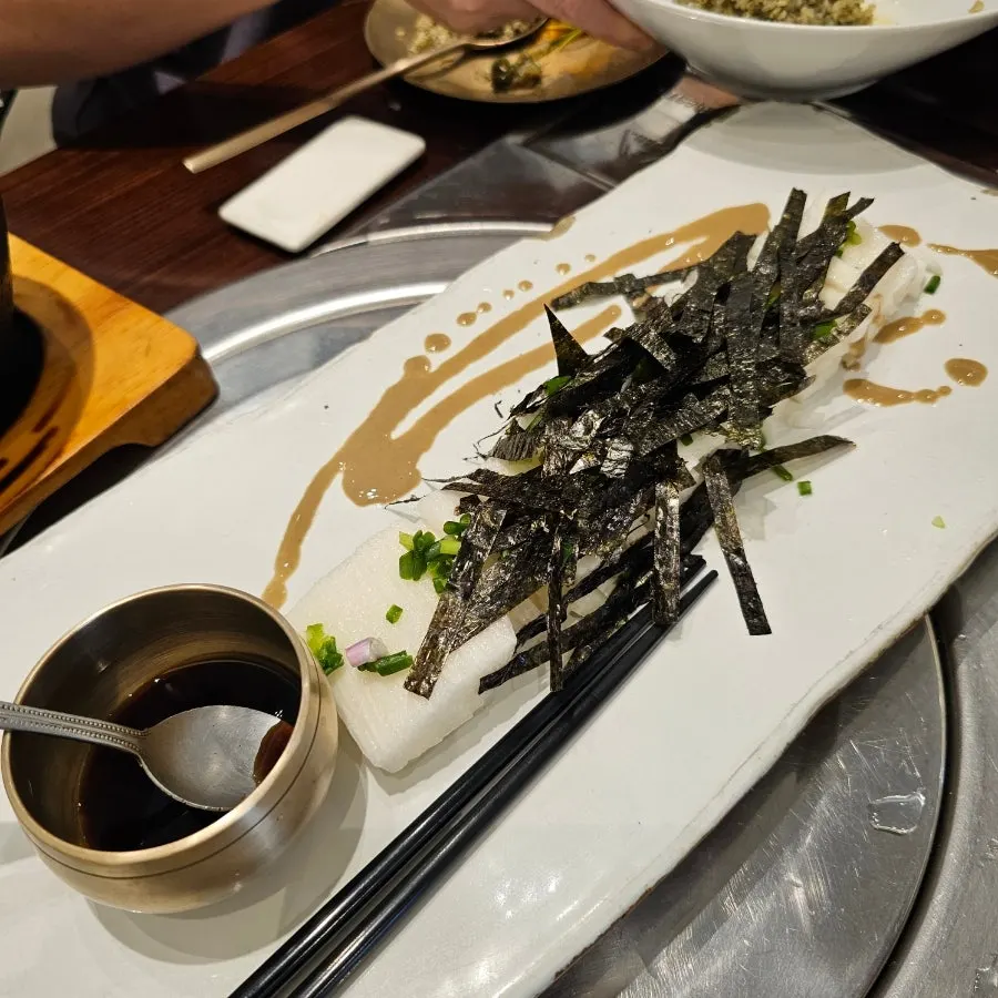 Yam salad served on a ceramic plate at Gaehwaok