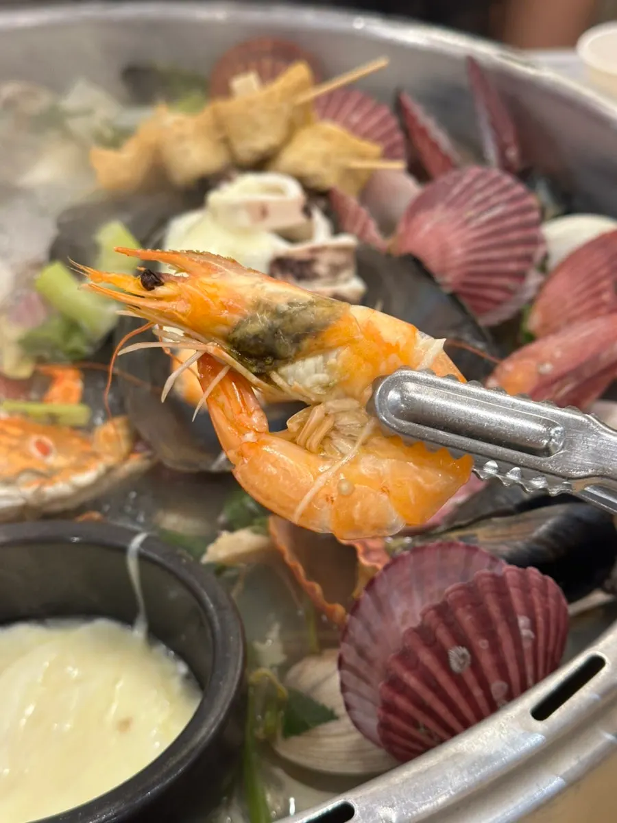 치즈 올린 오징어 한 점