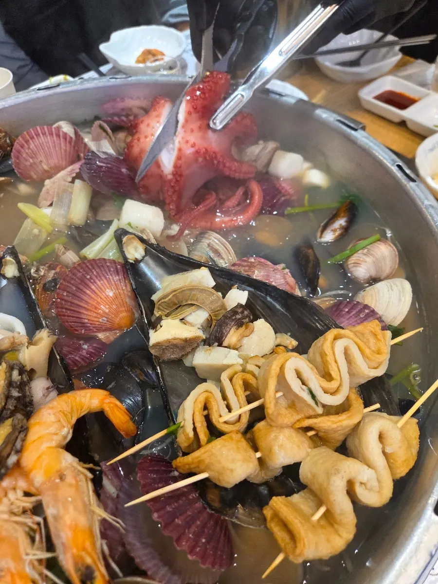 Octopus and whole squid cleaned and ready to eat