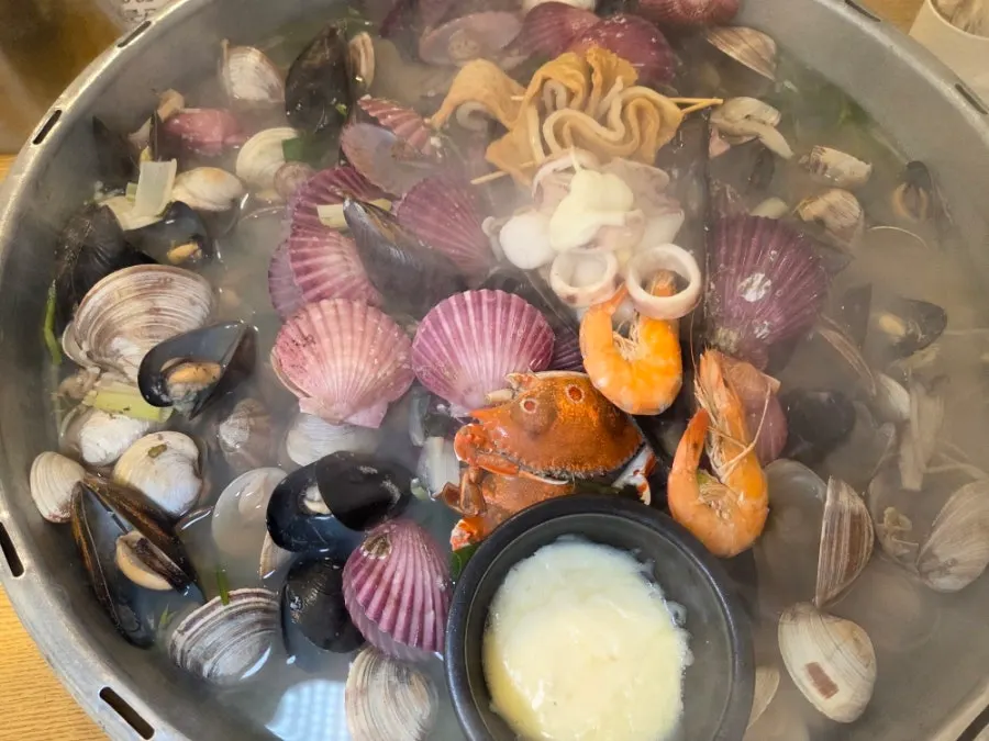 Giant clam hot pot piled high with seafood