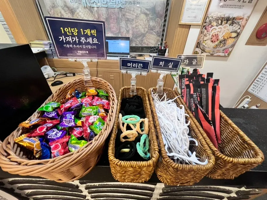 Service corner with candy, hair ties, dental floss and mouthwash