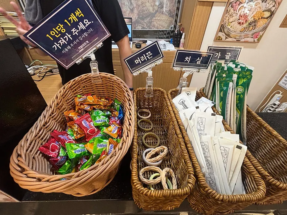 Mouthwash, hair ties, candy and dental floss set out at the register