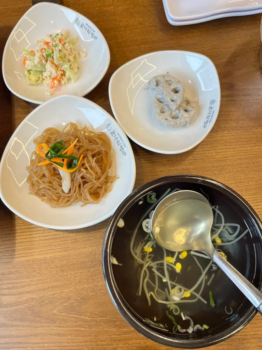 Seasoned bean sprouts and japchae among the basic banchan