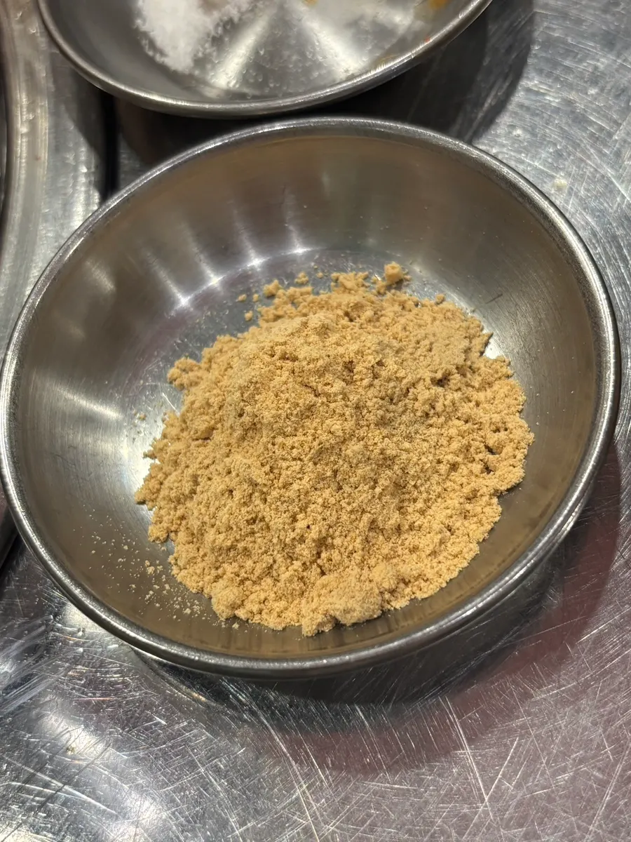 Grilled pork skin served with roasted soybean powder